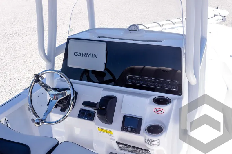 Slide: The Image of 2025 Tidewater 2110 Bay Max boat dashboard with Garmin navigation system. - 35