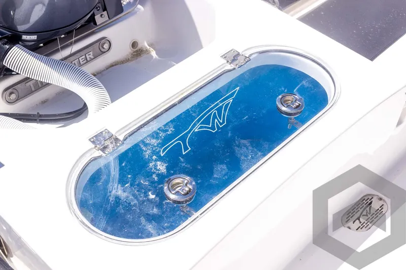 Slide: The Image of 2025 Tidewater 2110 Bay Max boat livewell with logo, featuring sleek design and functionality. - 45