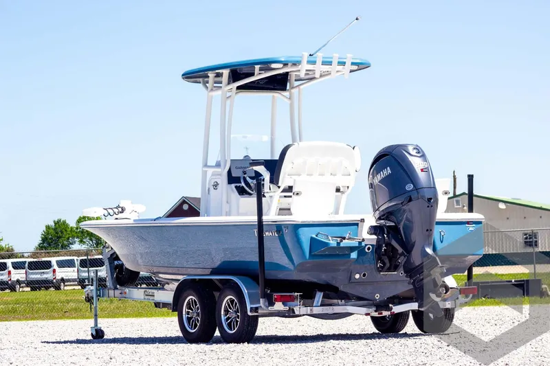 Slide: The Image of 2025 Tidewater 2110 Bay Max boat on trailer, featuring Yamaha outboard motor. - 7