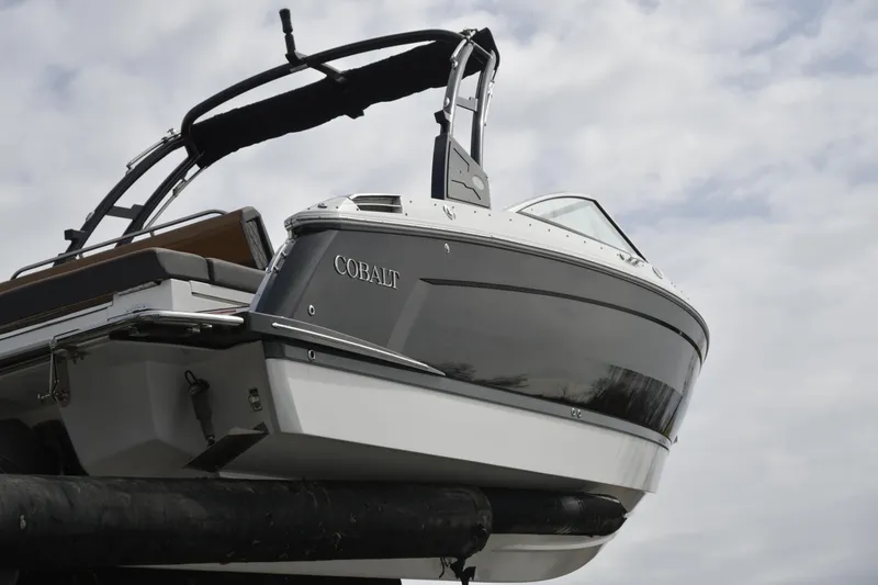 Slide: The Image of 2022 Cobalt R6 boat with sleek design, elevated view against cloudy sky. - 29