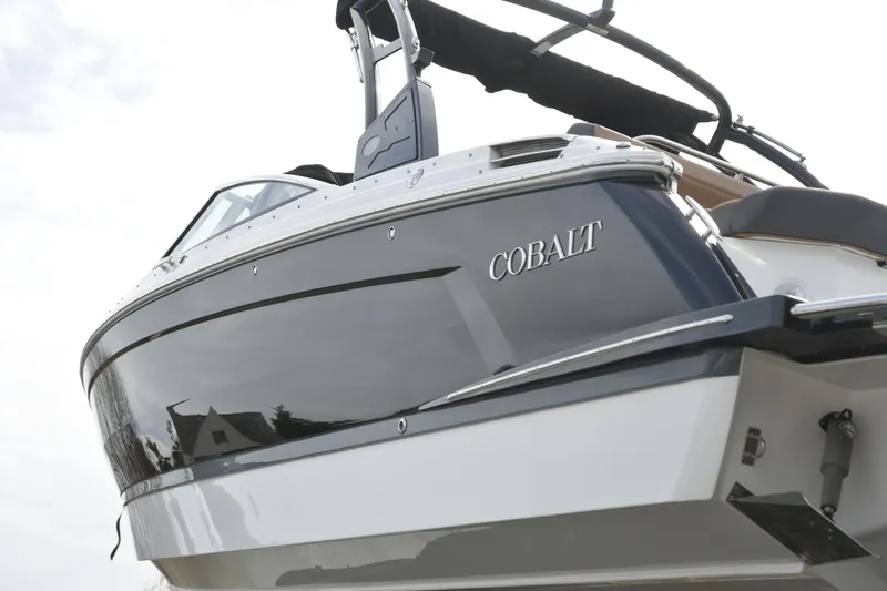 Slide: The Image of 2022 Cobalt R6 boat with sleek design and modern features, viewed from the side. - 30