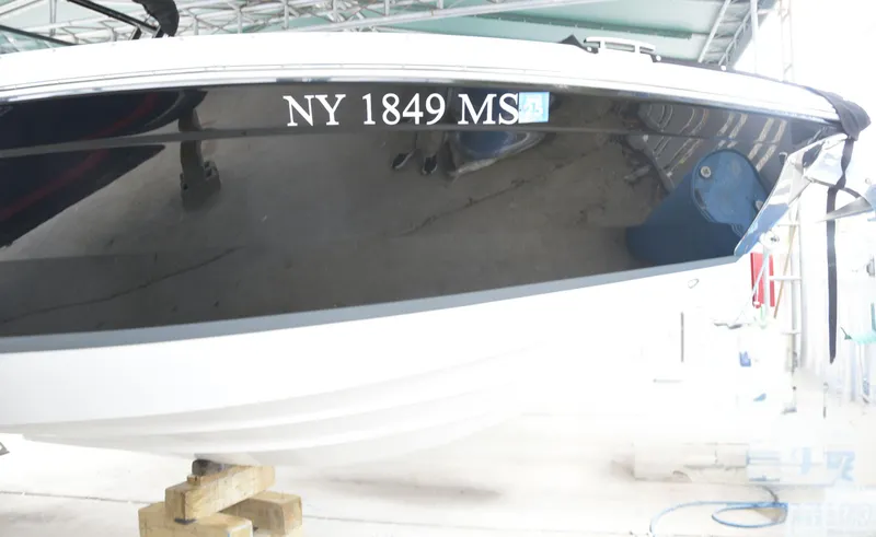 Slide: The Image of 2022 Cobalt R6 boat with registration NY 1849 MS, displayed in a storage facility. - 32