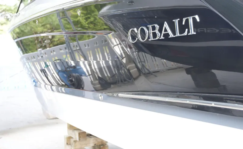 Slide: The Image of 2022 Cobalt R6 boat side view with reflective black finish. - 34