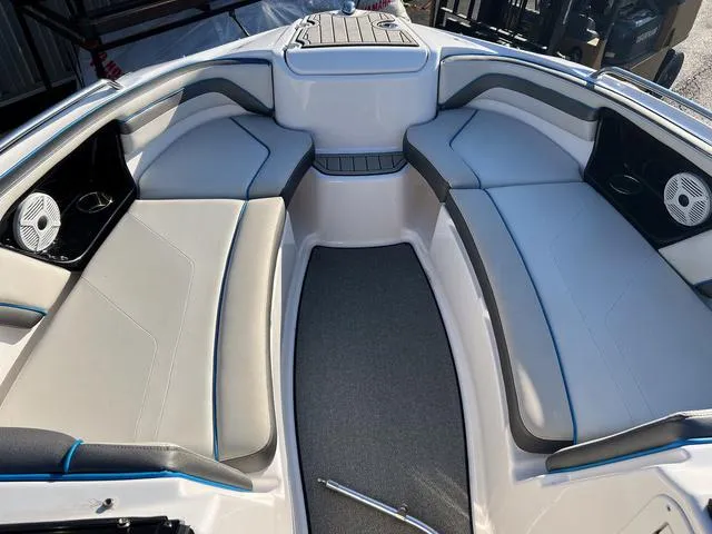 Slide: The Image of 2020 Yamaha Boats AR240 interior with spacious seating and modern design. - 19