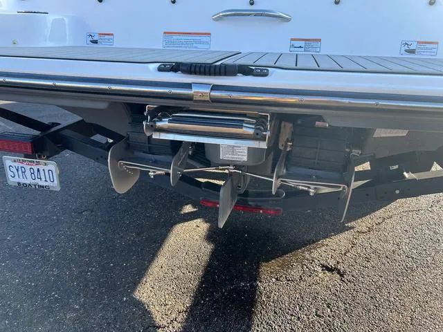 Slide: The Image of Rear view of 2020 Yamaha Boats AR240 with dual propellers and swim platform. - 4