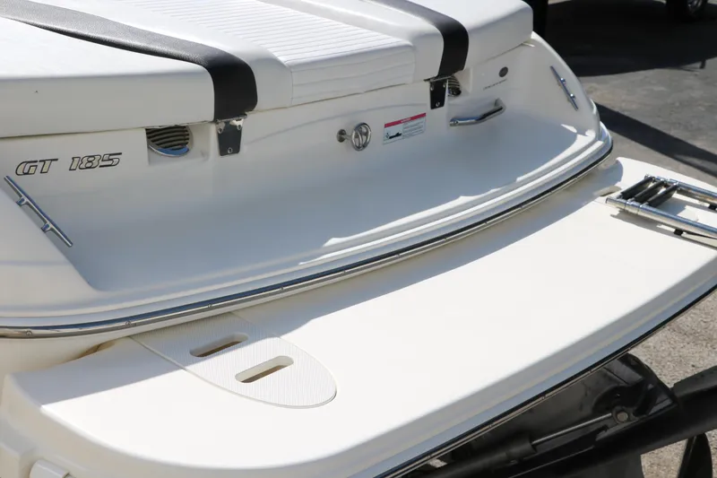 Slide: The Image of 2009 Glastron GT185 boat stern with swim platform and ladder. - 6