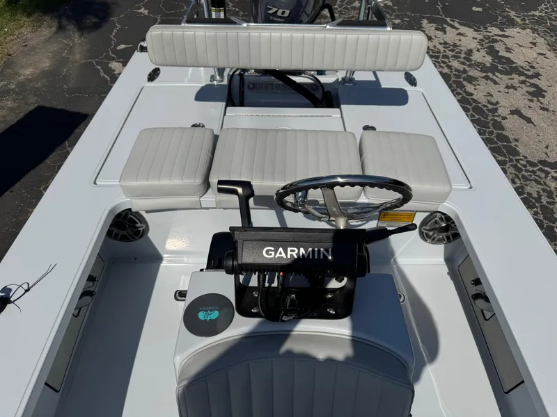 Slide: The Image of 2023 Hell's Bay Professional boat interior with Garmin navigation system. - 19