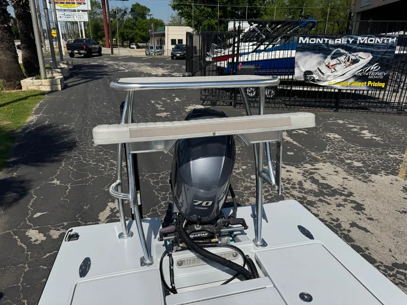 Slide: The Image of 2023 Hell's Bay Professional boat with Yamaha 70 engine, parked outdoors. - 25