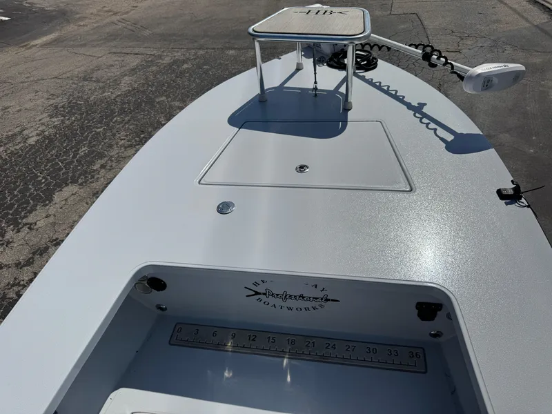 Slide: The Image of 2023 Hell's Bay Professional boat deck with storage and measurement markings. - 29