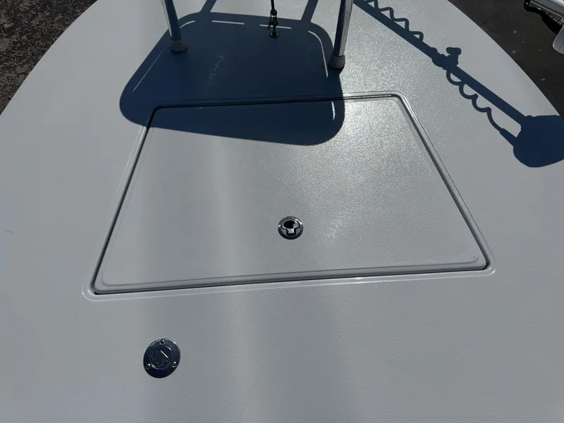 Slide: The Image of 2023 Hell's Bay Professional boat deck with storage hatch and shadow. - 30