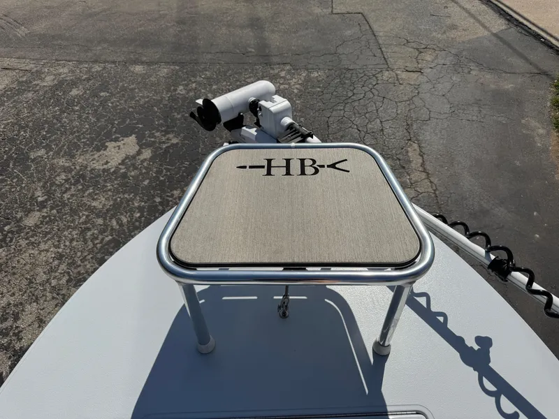 Slide: The Image of 2023 Hell's Bay Professional boat deck with HB logo and mounted equipment. - 35