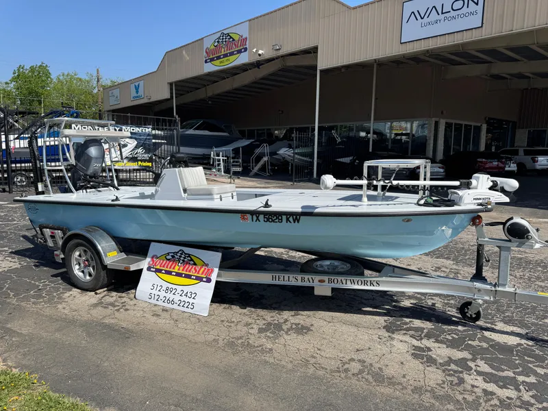 Slide: The Image of 2023 Hell's Bay Professional boat on trailer outside dealership. - 39