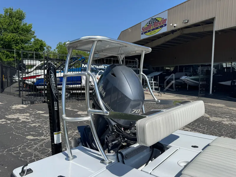 Slide: The Image of 2023 Hell's Bay Professional boat with Yamaha 70 engine at dealership. - 8