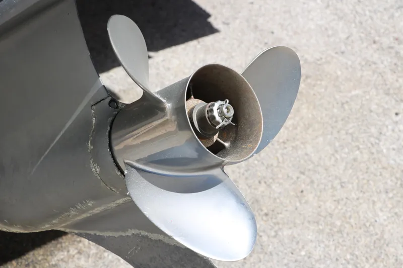Slide: The Image of Propeller of a 2007 Glastron GT205 boat on a concrete surface. - 30