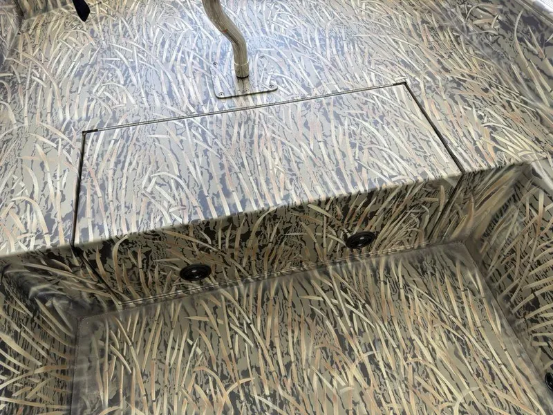 Slide: The Image of 2025 Tracker Grizzly® 1650 T Prairie Wings Edition with camouflage interior design. - 5