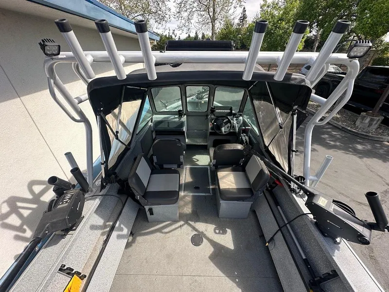 Slide: The Image of 2017 Smoker Craft 182 Phantom boat interior with seating and rod holders. - 14