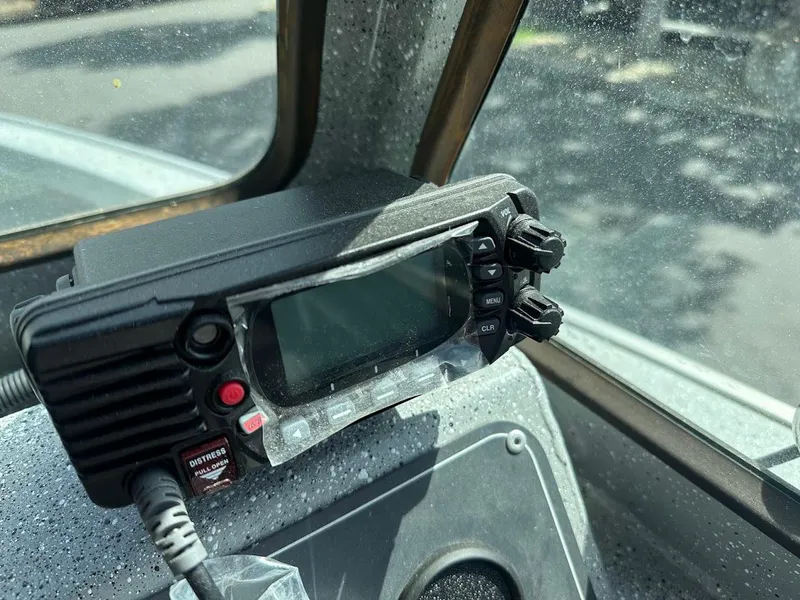 Slide: The Image of Close-up of a radio device inside a 2017 Smoker Craft 182 Phantom boat. - 29