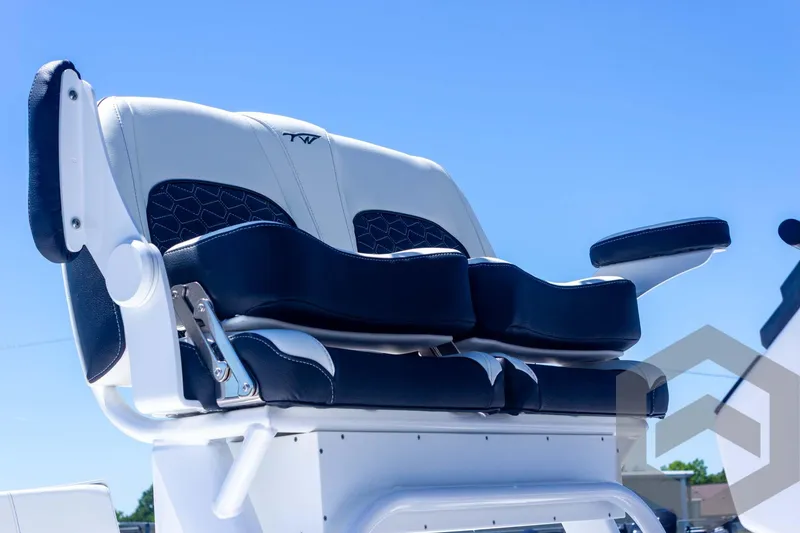 Slide: The Image of 2025 Tidewater 2410 Bay Max boat seating, featuring sleek design and comfortable cushioning. - 17