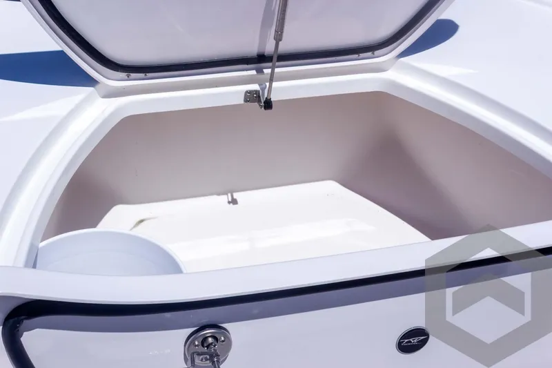 Slide: The Image of Open storage compartment of 2025 Tidewater 2410 Bay Max boat. - 23