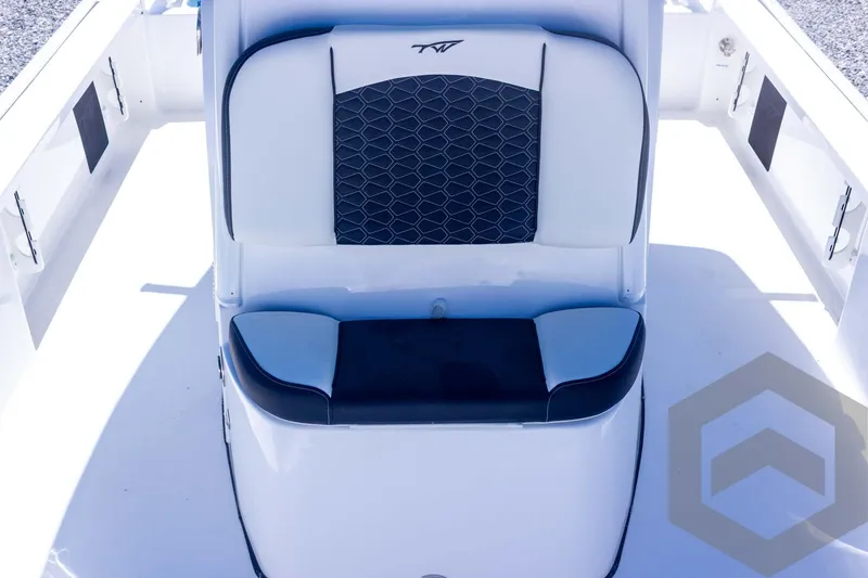 Slide: The Image of 2025 Tidewater 2410 Bay Max boat seat with stylish black and white design. - 27