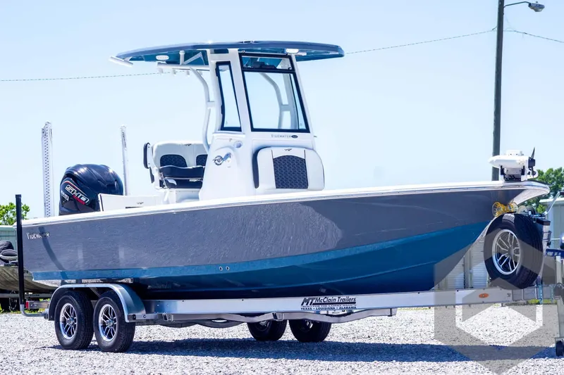 Slide: The Image of 2025 Tidewater 2410 Bay Max boat on trailer, featuring sleek design and modern features. - 3