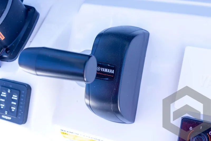 Slide: The Image of Yamaha throttle control on 2025 Tidewater 2410 Bay Max boat dashboard. - 35