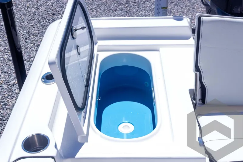 Slide: The Image of 2025 Tidewater 2410 Bay Max boat livewell with open lid, showcasing interior design. - 40