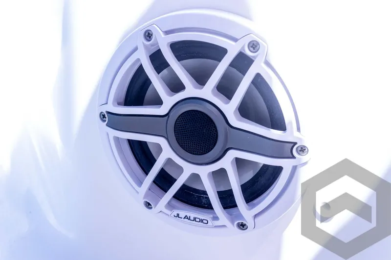 Slide: The Image of JL Audio speaker on 2025 Tidewater 2410 Bay Max boat, close-up view. - 44