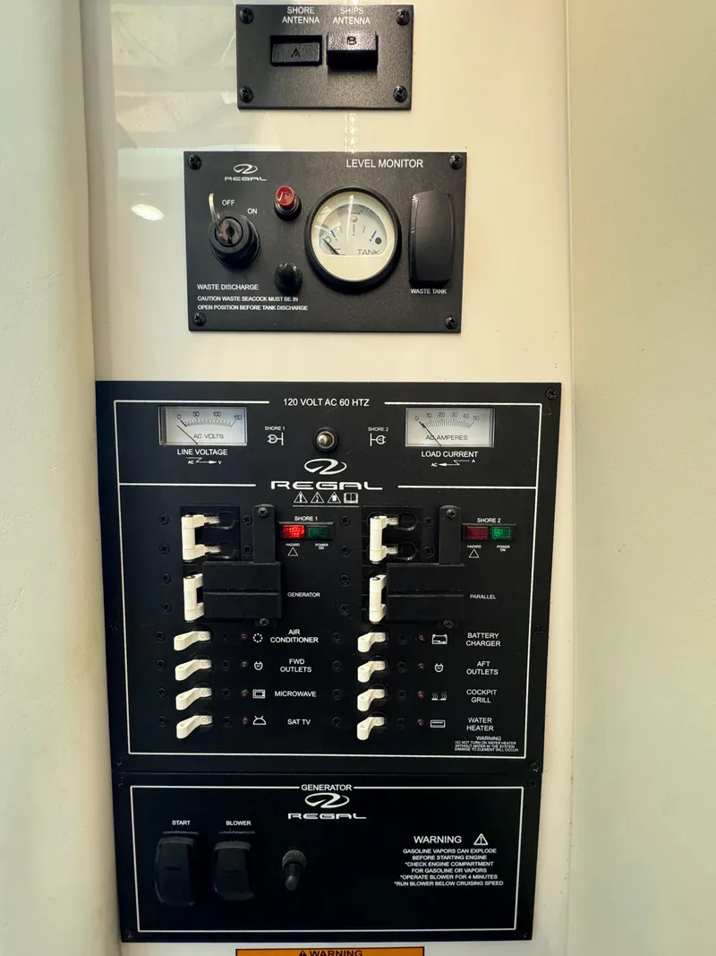 Slide: The Image of Electrical control panel of a 2019 Regal 33 SAV boat with level monitor. - 31