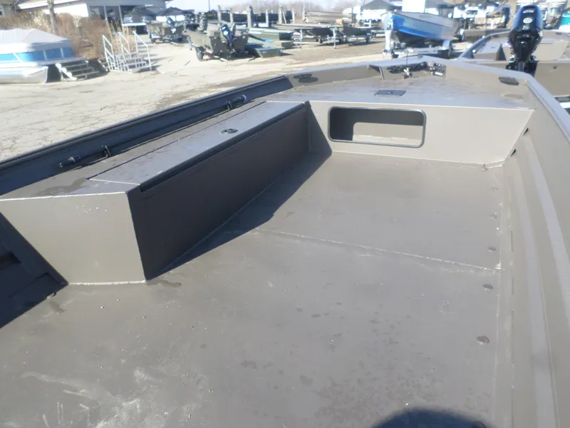 Slide: The Image of 2025 Alweld 1856 VV Marsh boat interior, showcasing spacious deck and storage area. - 8