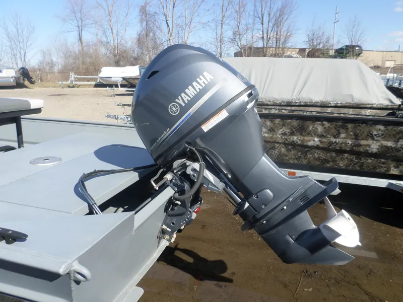 Slide: The Image of 2023 Alweld 1760 VV Marsh boat with Yamaha outboard motor in a sunny outdoor setting. - 7