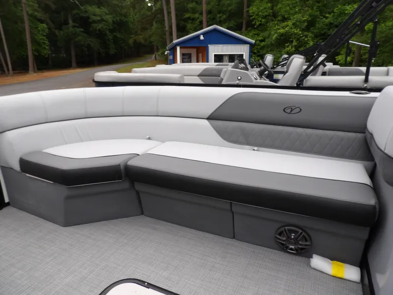Slide: The Image of 2025 Veranda Vista Sport 22RC boat interior with sleek gray seating and modern design. - 12