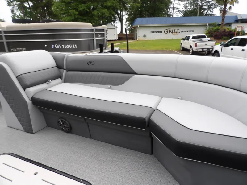 Slide: The Image of 2025 Veranda Vista Sport 22RC boat interior with sleek gray seating and modern design. - 13