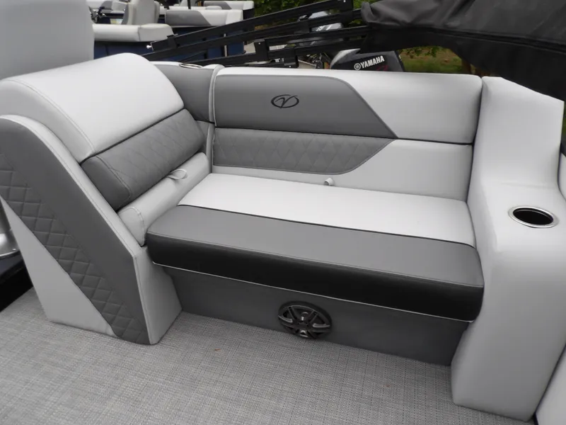 Slide: The Image of 2025 Veranda Vista Sport 22RC boat seating with gray and white upholstery. - 16