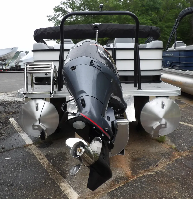 Slide: The Image of 2025 Veranda Vista Sport 22RC pontoon boat with powerful outboard motor, rear view. - 9