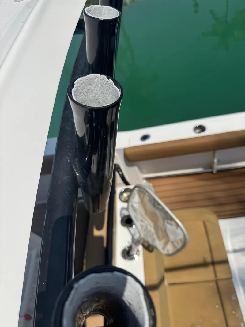 Slide: The Image of Close-up of rod holders on a 2020 Sea Hunt Gamefish 30 boat. - 28