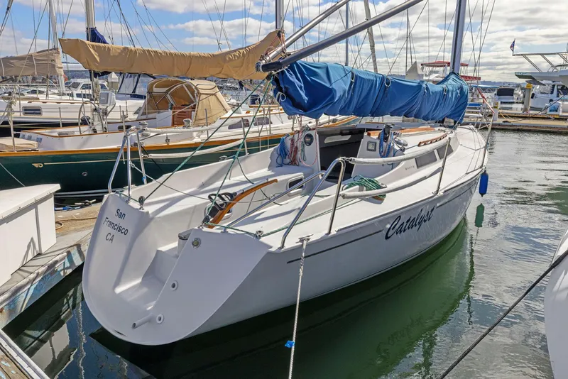 Slide: The Image of 2004 Wyliecat 30 sailboat docked in marina, blue sail cover, San Francisco, CA. - 3