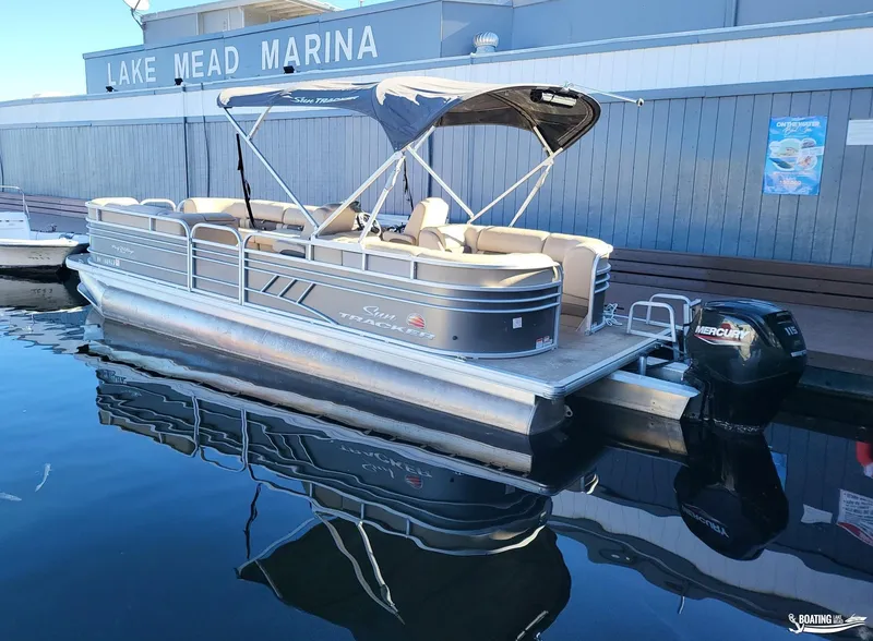 Slide: The Image of 2020 Tracker Party Barge 24 DLX pontoon boat docked at Lake Mead Marina. - 3