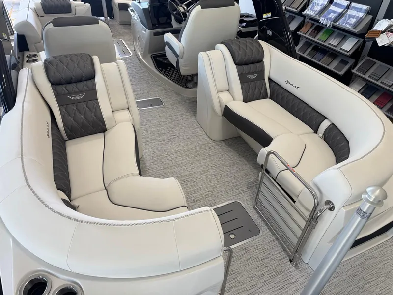 Slide: The Image of Luxurious interior of 2025 Bennington 25QFBA boat with plush seating and modern design. - 15