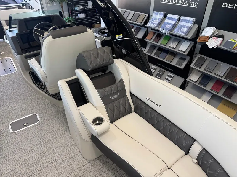 Slide: The Image of 2025 Bennington 25QFBA boat interior with luxurious seating and modern design elements. - 22