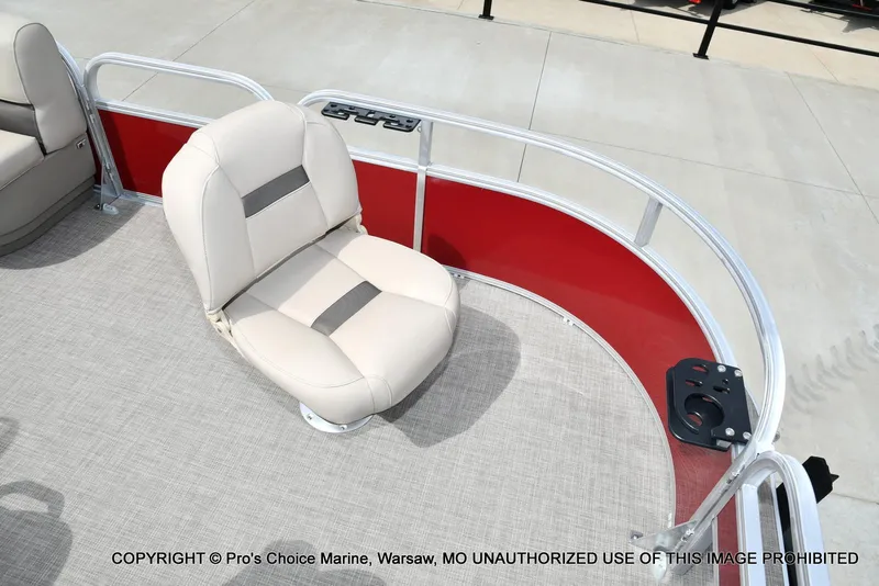 Slide: The Image of 2025 Sun Tracker Bass Buggy 16 DLX boat interior with red paneling and beige seating. - 19