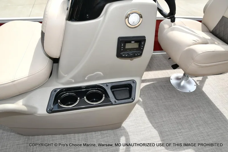 Slide: The Image of 2025 Sun Tracker Bass Buggy 16 DLX interior with cup holders and seating. - 30