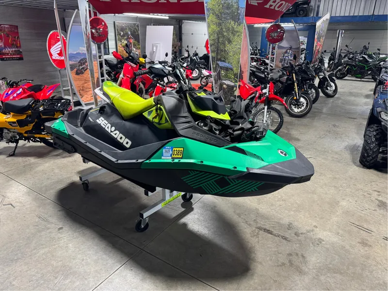 Slide: The Image of 2019 Sea-Doo Spark Trixx 2up iBR with Sound System in showroom. - 3