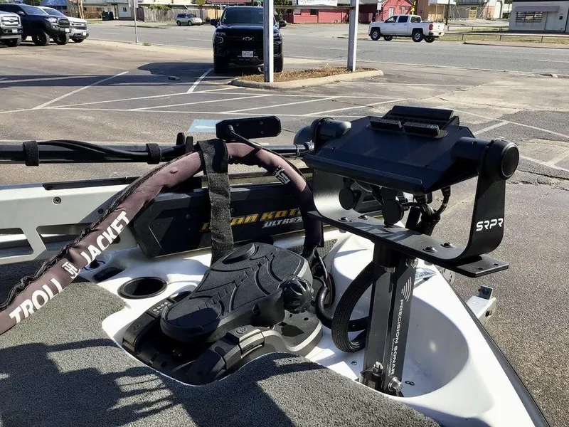Slide: The Image of 2018 Bass Cat Panterra II boat with trolling motor and control panel in parking lot. - 22