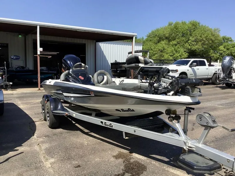 Slide: The Image of 2018 Bass Cat Panterra II boat on trailer, parked outside a garage. - 36