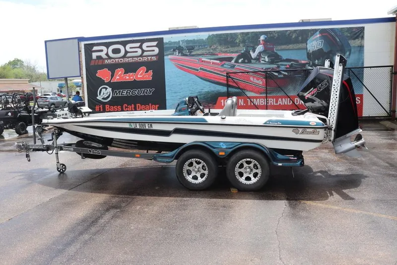 Slide: The Image of 2021 Bass Cat Pantera II boat on trailer at Ross Motorsports dealership. - 1