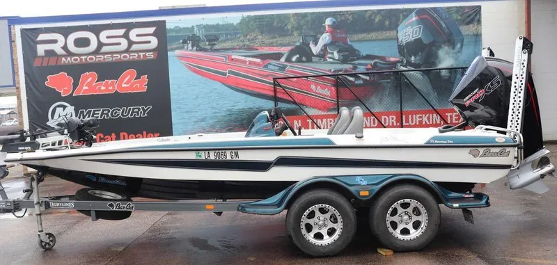 Slide: The Image of 2021 Bass Cat Pantera II boat at Ross Motorsports dealership display. - 2