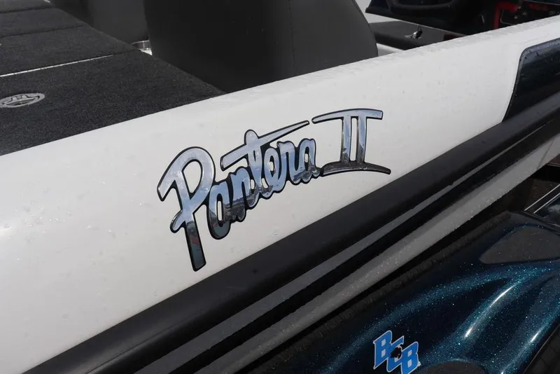 Slide: The Image of 2021 Bass Cat Pantera II boat logo on white surface. - 23