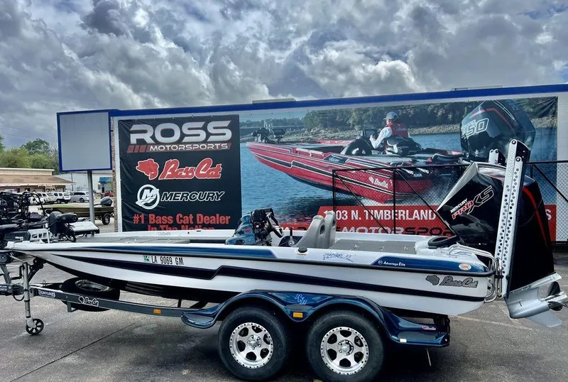 Slide: The Image of 2021 Bass Cat Pantera II boat at Ross Motorsports dealership under cloudy sky. - 29
