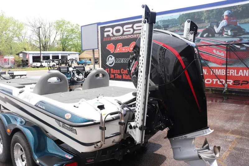 Slide: The Image of 2021 Bass Cat Pantera II boat with powerful outboard motor at dealership. - 3